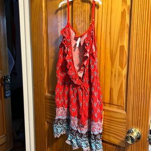 Size medium romper with button enclosure on top by Xhilaration